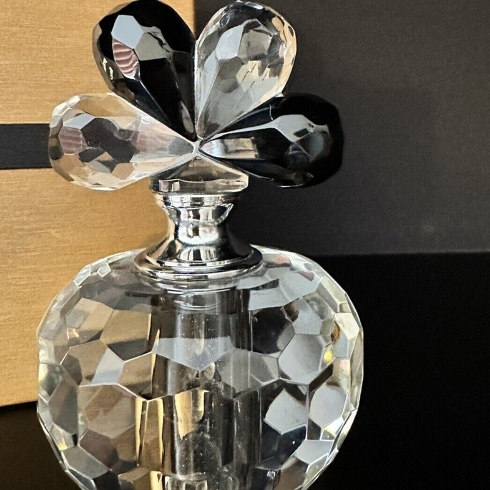 Elegant Crystal Perfume Bottle with Black and Clear Accents